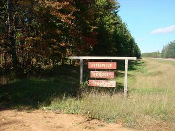 Sign at entrance to school forest